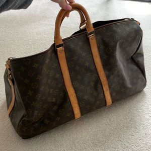 Louis Vuitton Bandouliere 55
Travel Bag